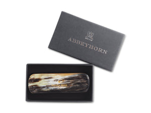 Small horn backed clothes and hat brush in box
