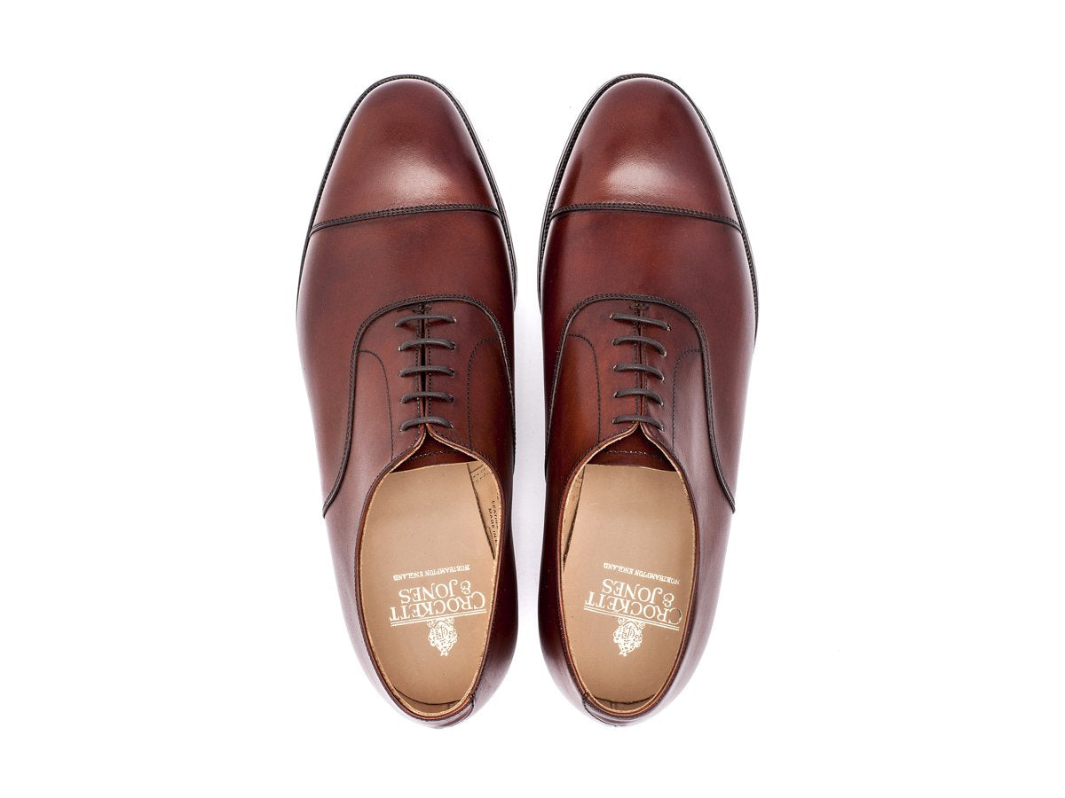 Top view of Crockett & Jones Connaught plain captoe oxford shoes in chestnut burnished calf