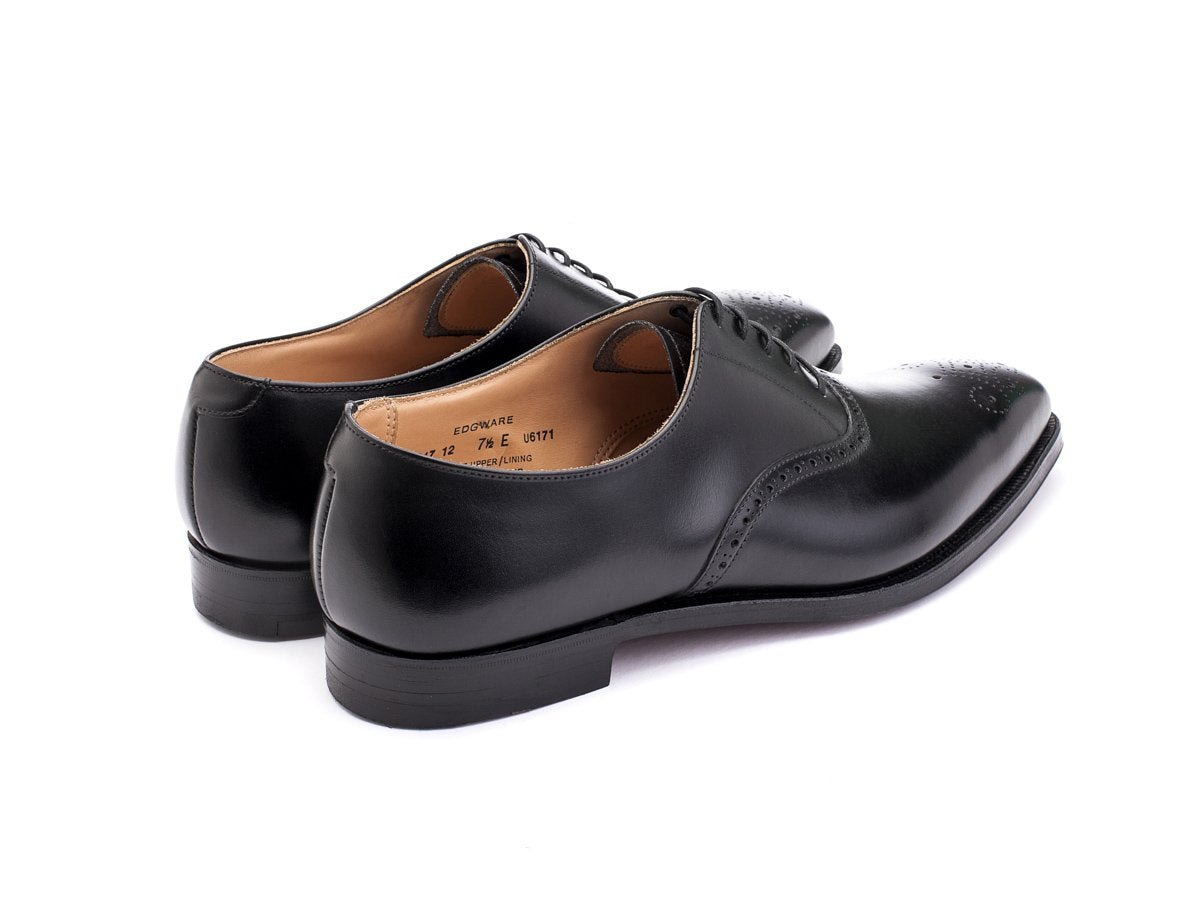 Back angle view of Crockett & Jones Edgware medallion brogue oxford shoes in black calf
