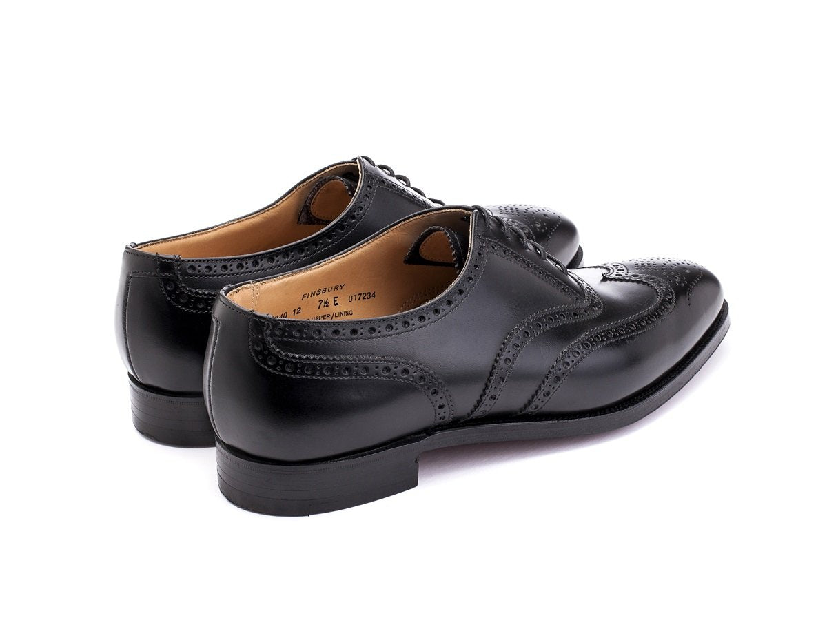 Back angle view of Crockett & Jones Finsbury wingtip full brogue oxford shoes in black calf