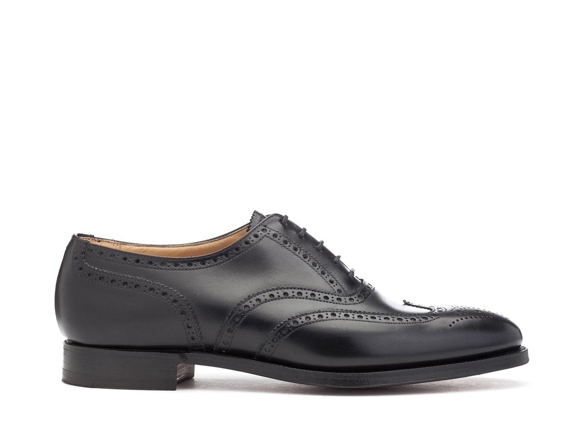 Side view of Crockett & Jones Finsbury wingtip full brogue oxford shoes in black calf