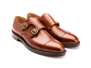 Front angle view of Crockett & Jones Harrogate captoe Shopovas strap shoes in tan scotch grain calf