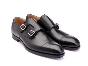 Front angle view of Crockett & Jones Lowndes captoe Shopovas strap shoes in black calf