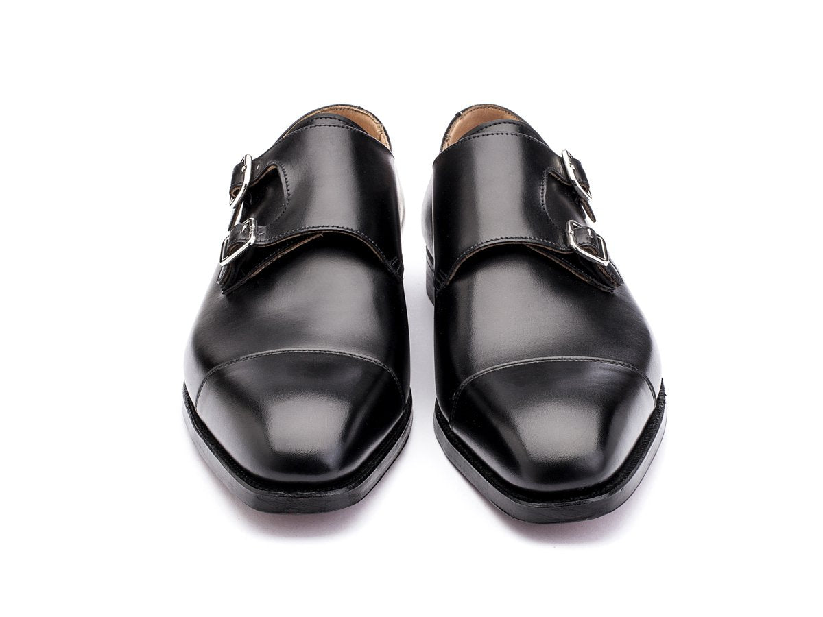 Front view of Crockett & Jones Lowndes captoe Shopovas strap shoes in black calf