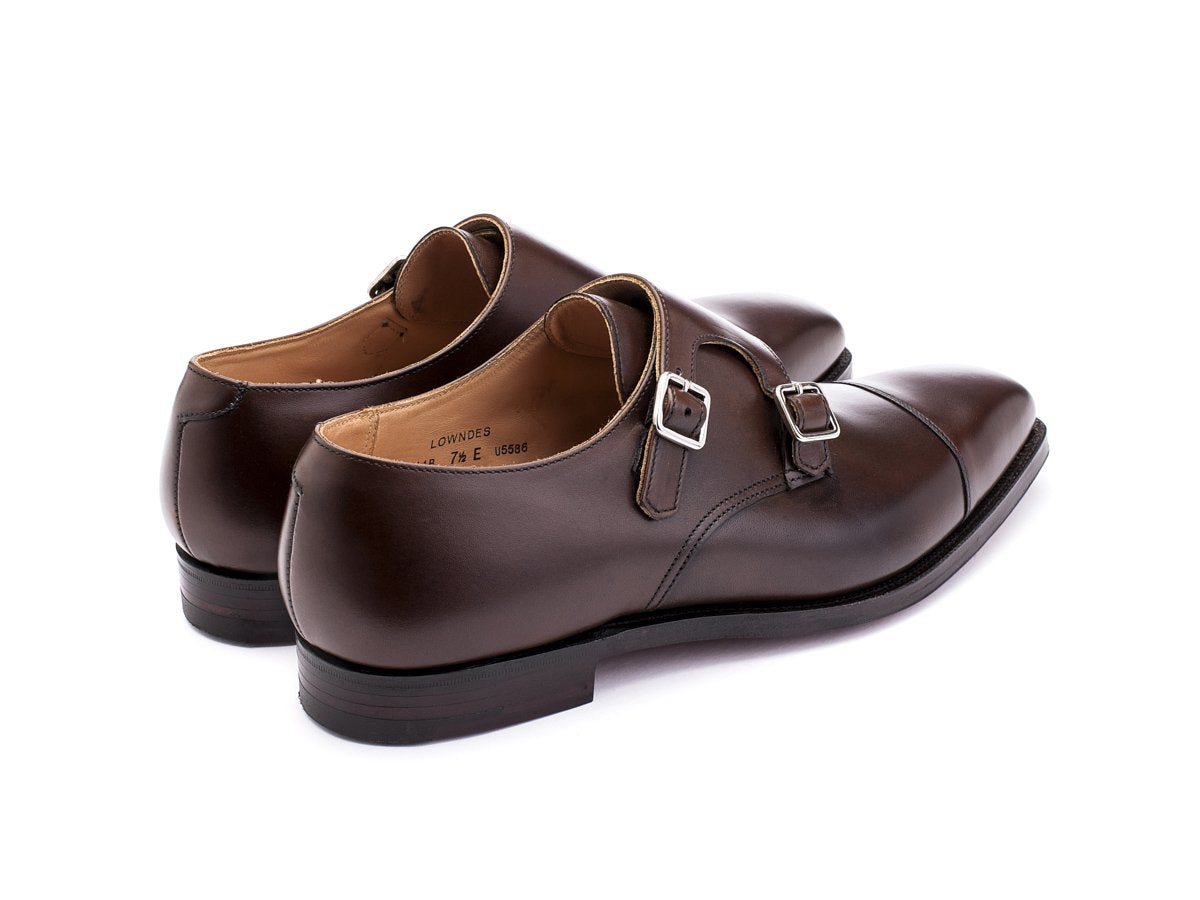 Back angle view of Crockett & Jones Lowndes captoe Shopovas strap shoes in dark brown burnished calf