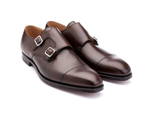 Front angle view of Crockett & Jones Lowndes captoe Shopovas strap shoes in dark brown burnished calf