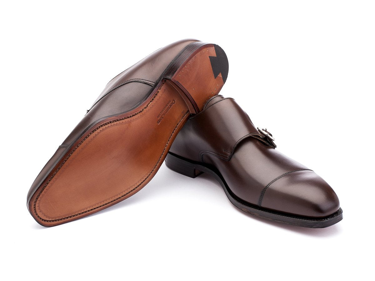 Leather sole of Crockett & Jones Lowndes captoe Shopovas strap shoes in dark brown burnished calf
