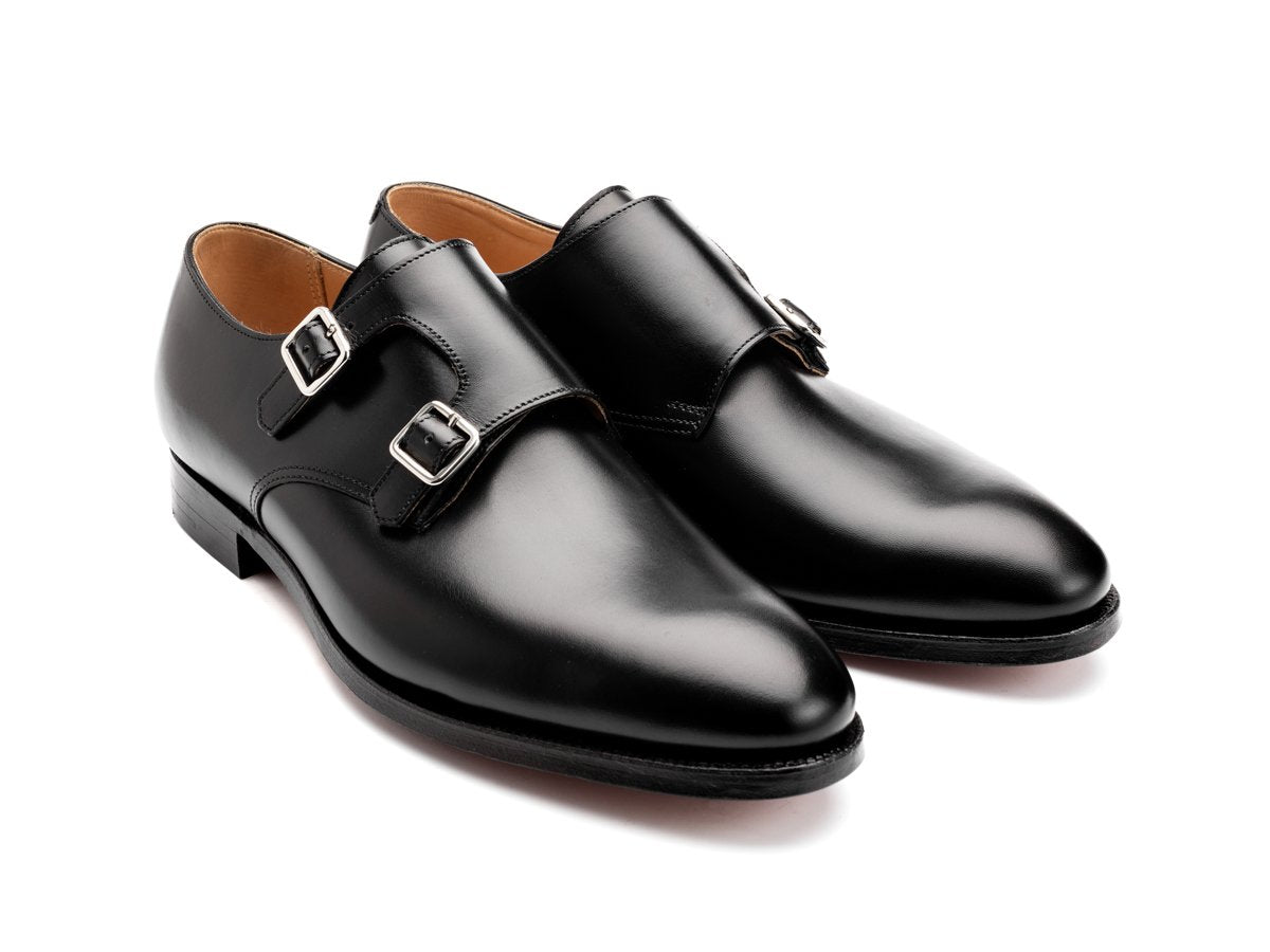 Front angle view of Crockett & Jones Melbourne plain toe Shopovas strap shoes in black calf