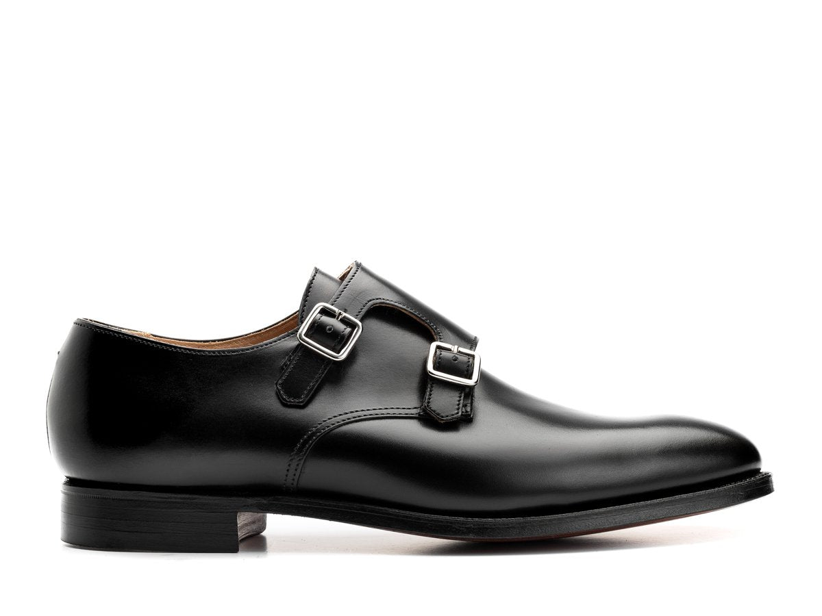 Side view of Crockett & Jones Melbourne plain toe Shopovas strap shoes in black calf