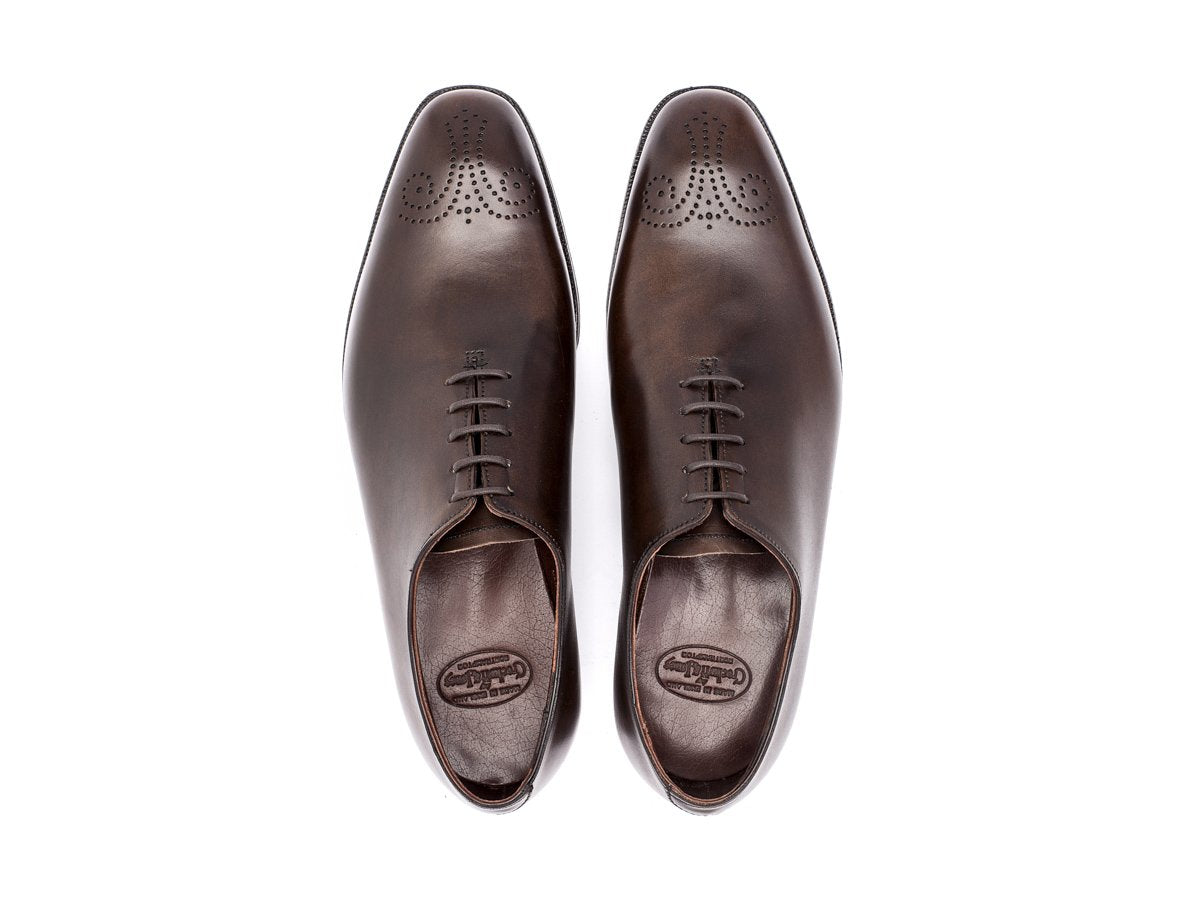 Top view of Crockett & Jones Weymouth wholecut medallion oxford shoes in dark brown antique calf