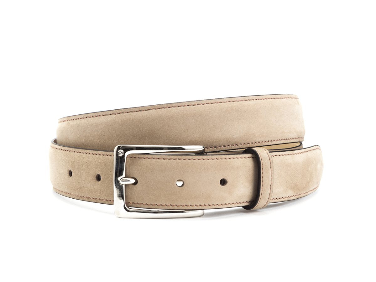 Front view of Edward Green beige nubuck belt with nickel buckle