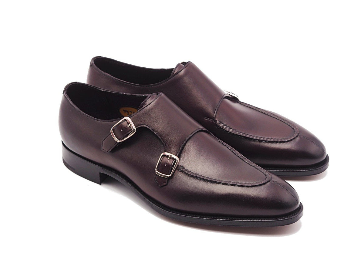 Front angle view of Edward Green Fulham split toe Shopovas strap shoes in nightshade antique calf
