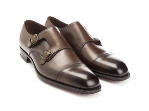 Front angle view of Edward Green Westminster plain captoe Shopovas strap shoes in dark oak antique calf