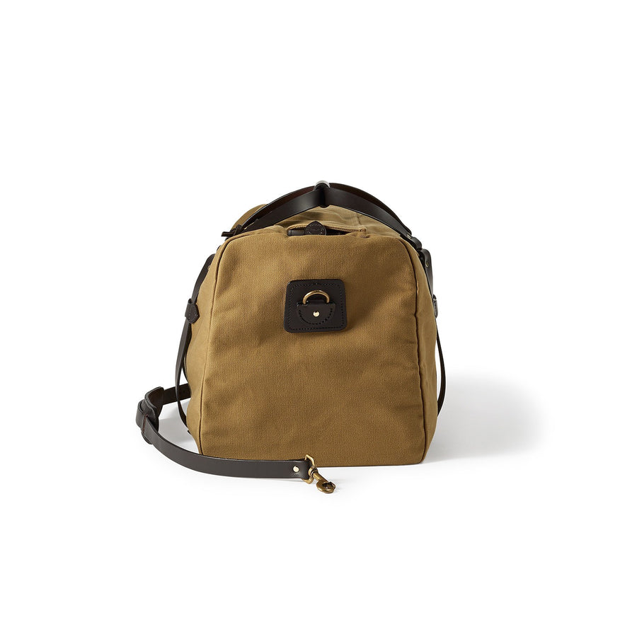 Side view of Filson Medium Duffle bag in tan