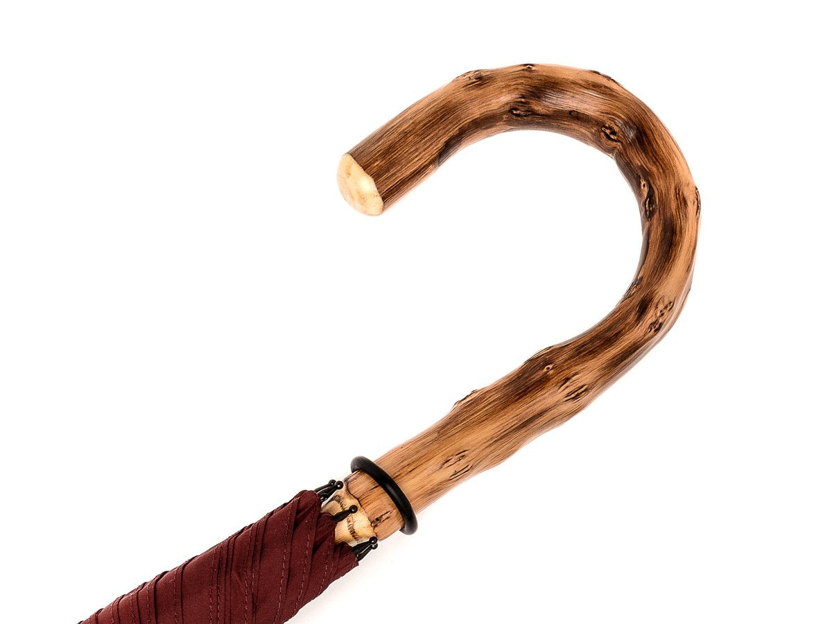 Handle of solid congo Fox Umbrella with burgundy canopy