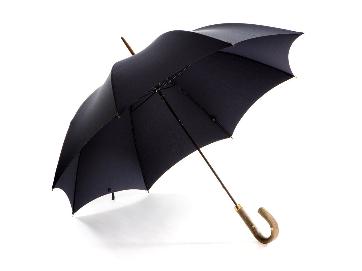 Opened ash handle tube Fox Umbrella with navy canopy