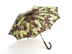 Opened dark brown wood handle tube Fox Umbrella with camouflage canopy