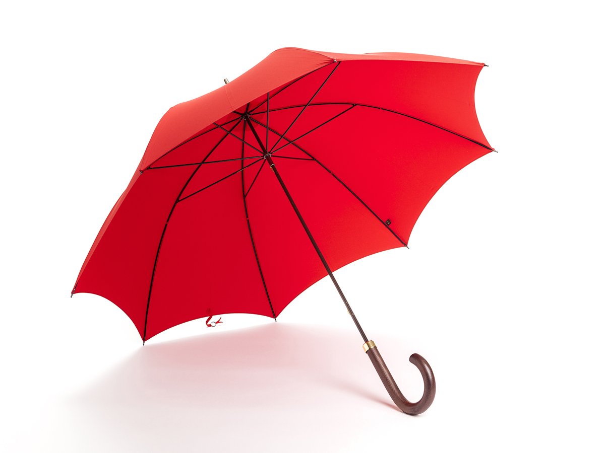 Opened dark brown wood handle tube Fox Umbrella with red canopy