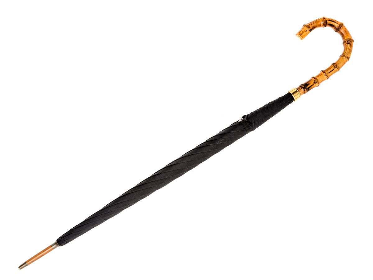 Full length view of whangee handle tube Fox Umbrella with black canopy