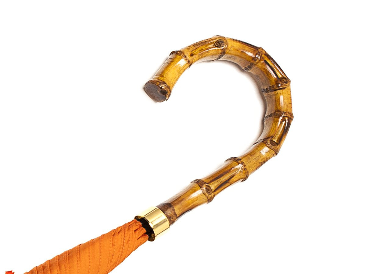 Whangee handle of tube Fox Umbrella with orange canopy