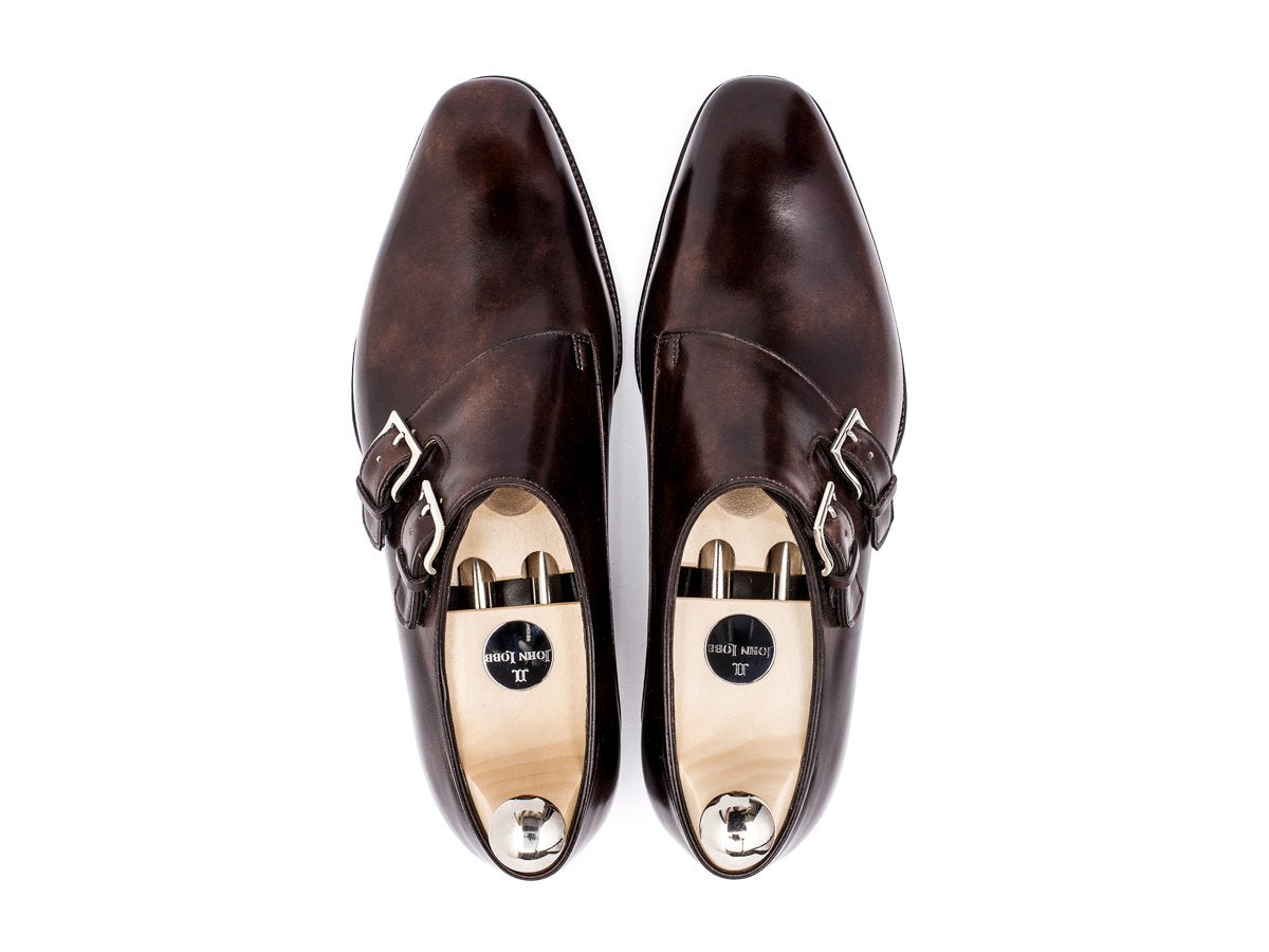 Top view of John Lobb Chapel plain toe swept back Shopovas strap shoes in dark brown museum calf with shoe trees