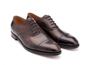 Front angle view of John Lobb City II plain captoe oxford shoes in dark brown museum calf