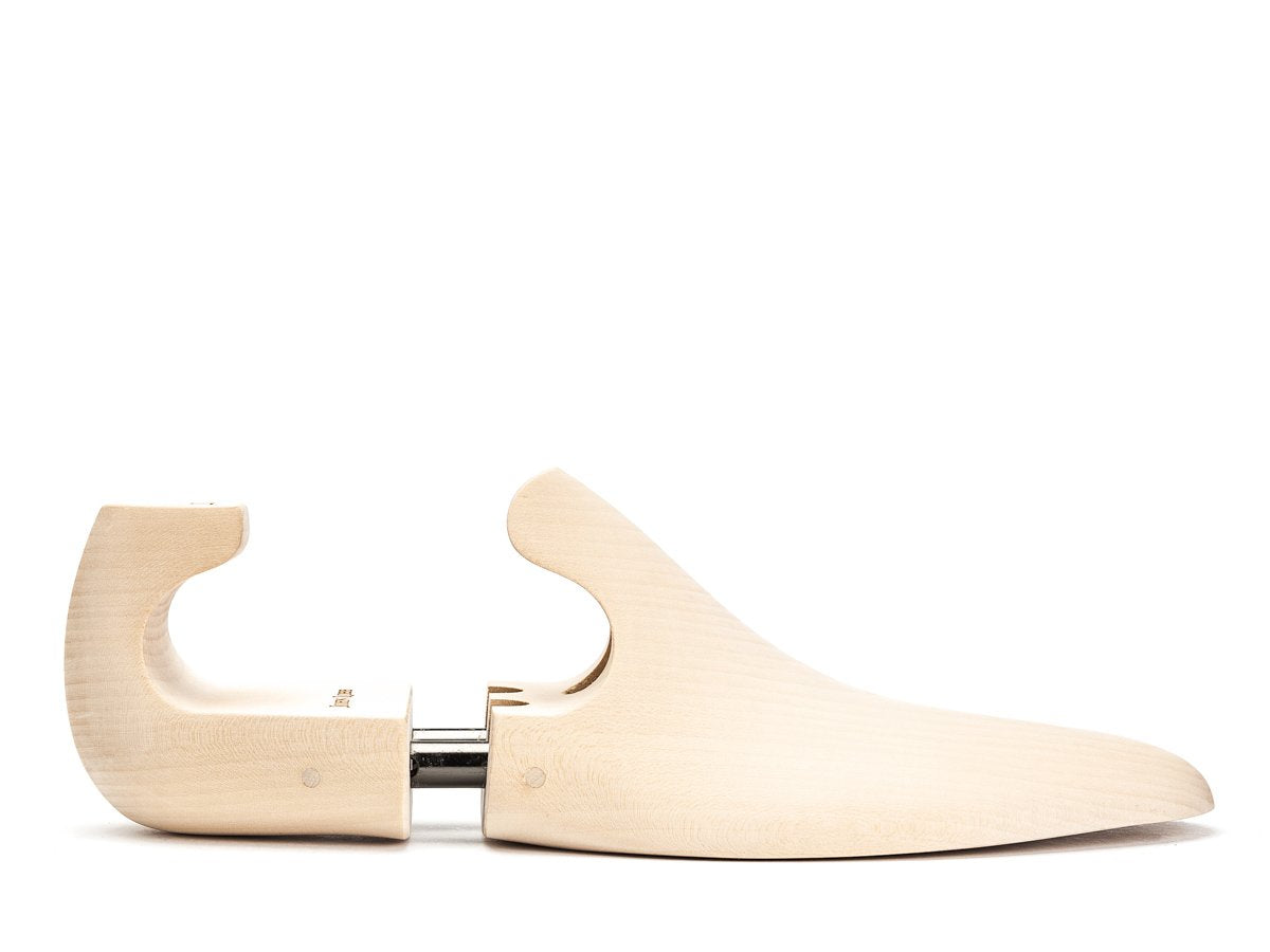 Side view of E width John Lobb limewood shoe trees