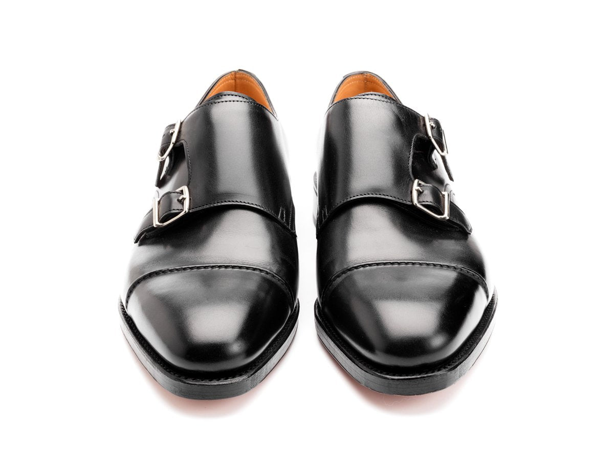 Front view of John Lobb William II captoe Shopovas strap shoes in black calf
