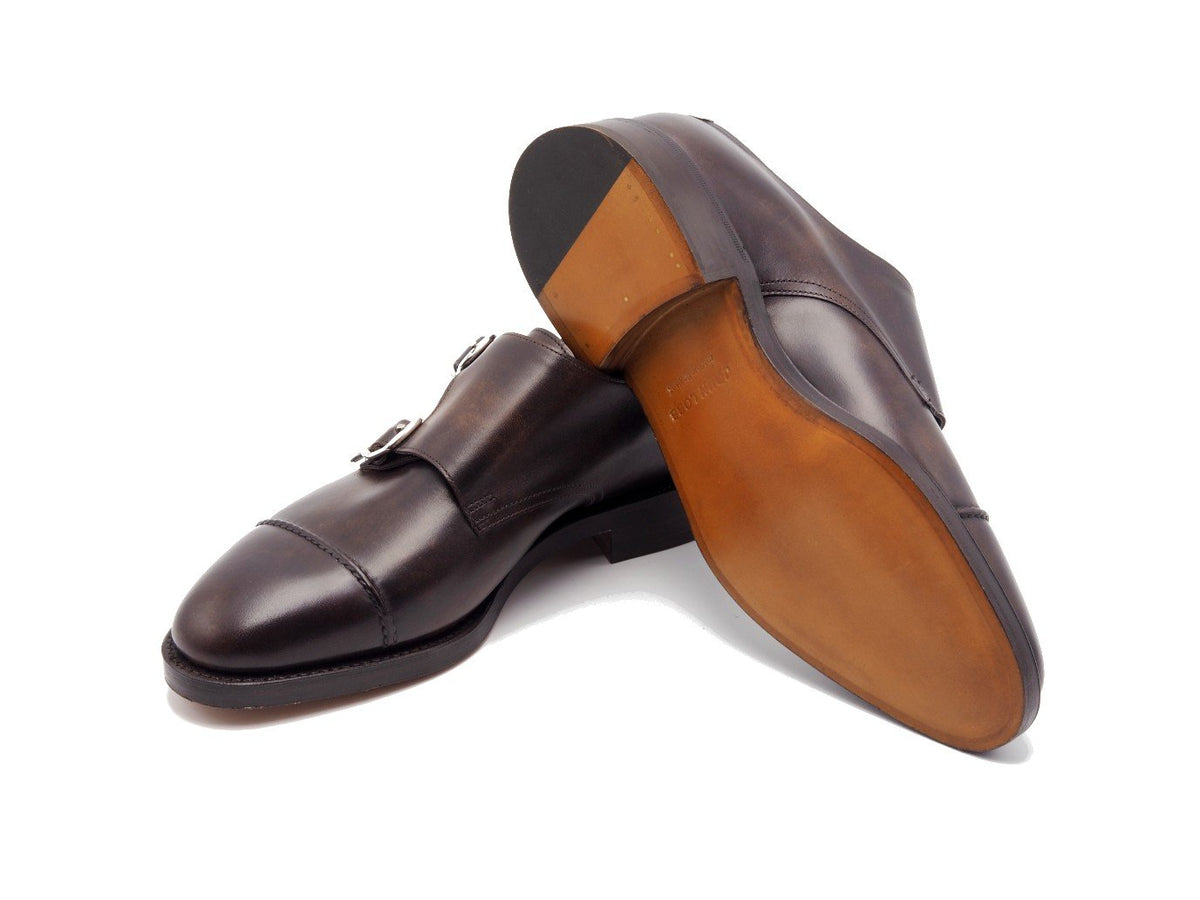 Classic leather sole of John Lobb William II captoe Shopovas strap shoes in dark brown museum calf