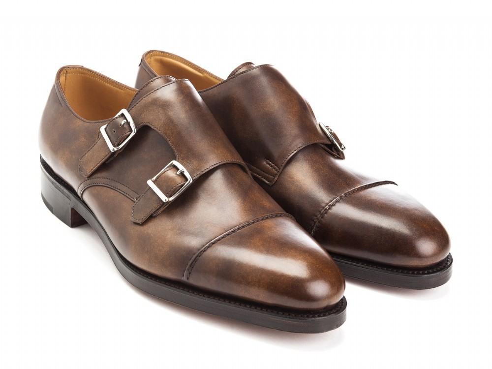 Front angle view of John Lobb William II captoe Shopovas strap shoes in parisian brown museum calf
