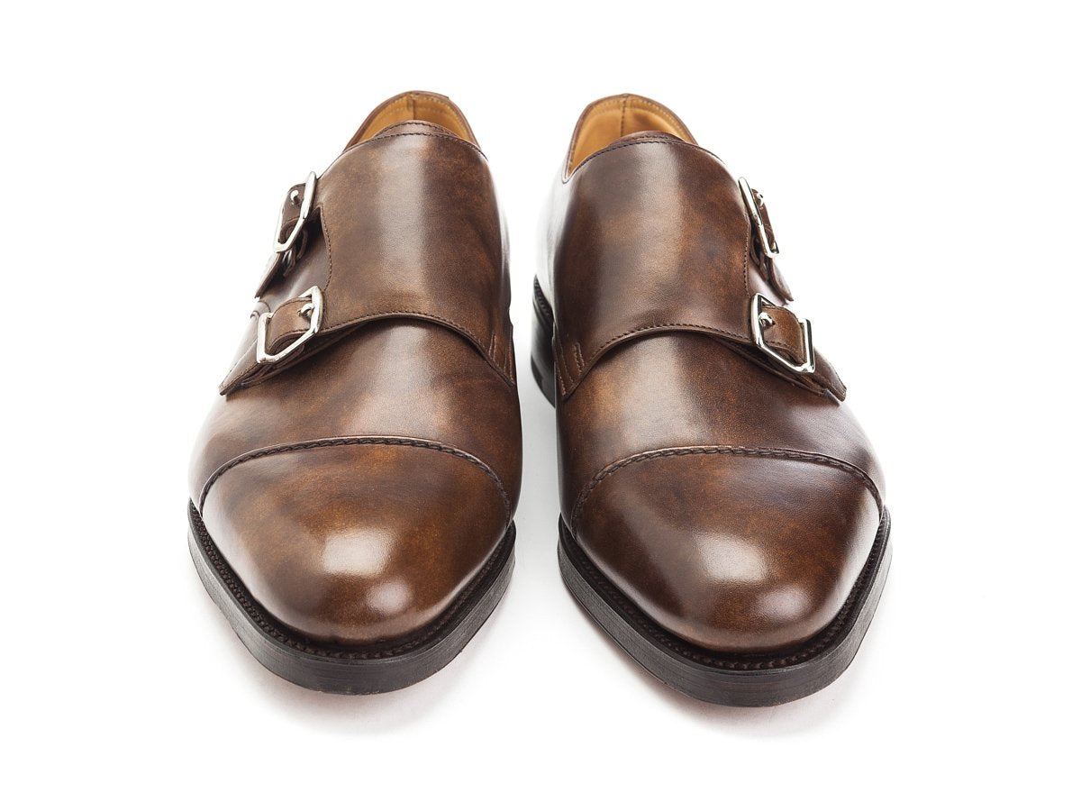 Front view of John Lobb William II captoe Shopovas strap shoes in parisian brown museum calf