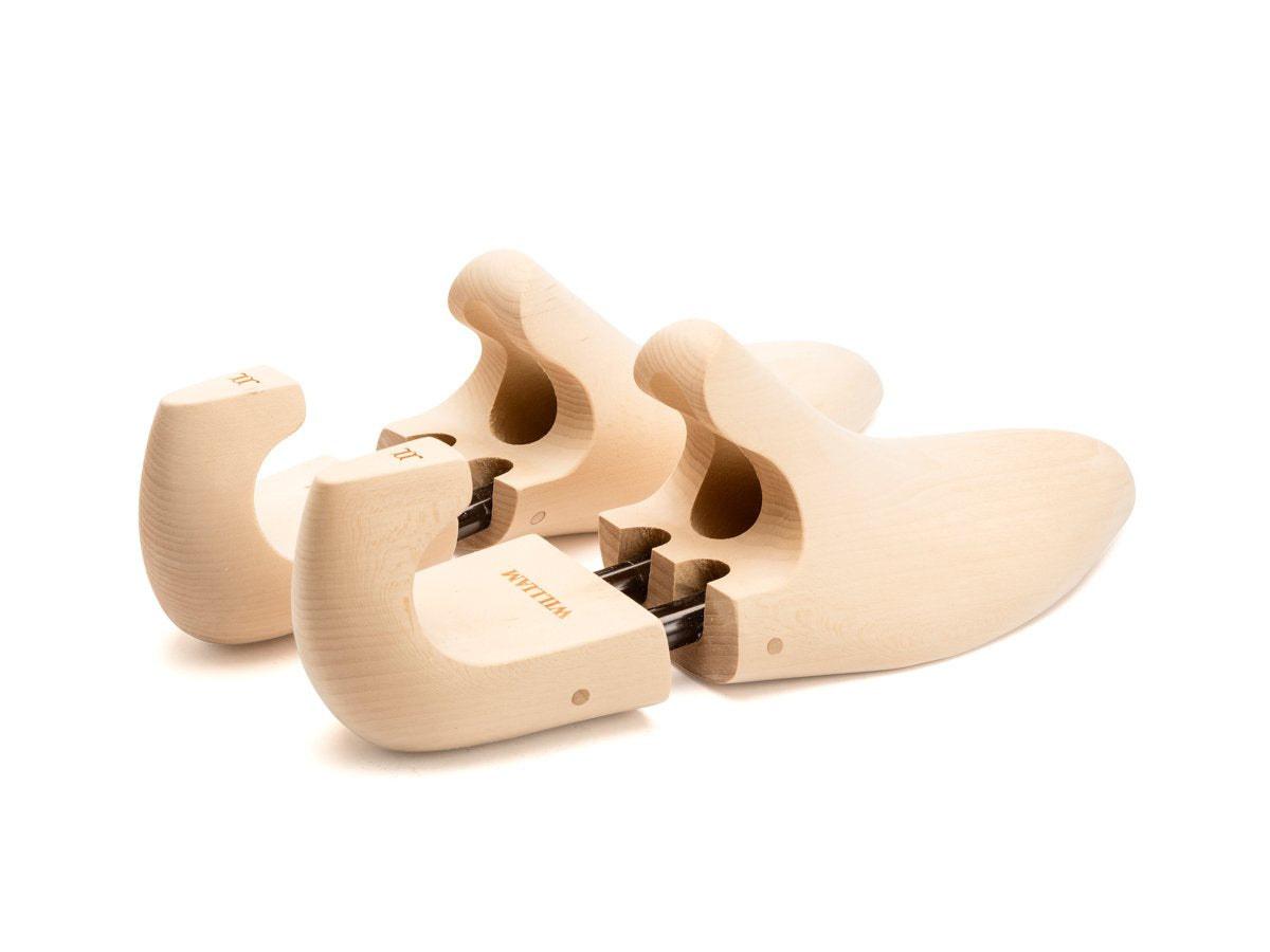 Back angle view of E width John Lobb William limewood shoe trees